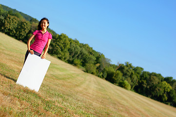 Image showing Girl With Poster