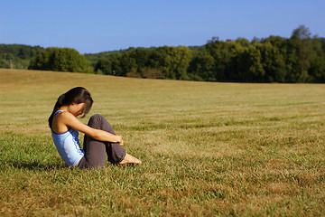 Image showing Girl Practicing Yoga In Field