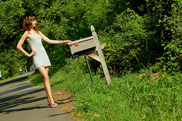 Image showing Girl Checking Mail