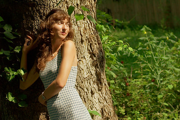 Image showing Sexy Girl Against Tree