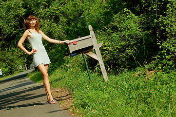 Image showing Girl Checking Mail