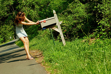 Image showing Girl Checking Mail