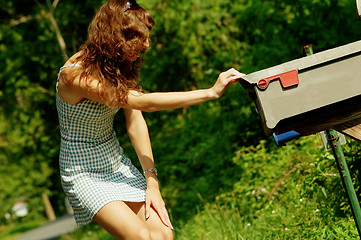 Image showing Girl Checking Mail