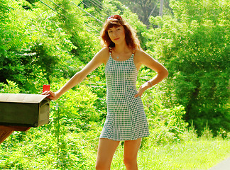 Image showing Girl Checking Mail