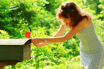 Image showing Girl Checking Mail