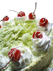 Image showing delicious cake with cherries on top
