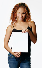 Image showing Pretty Girl Holding Blank Media