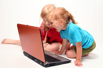 Image showing Playing on laptop