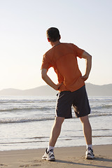 Image showing Jogger doing fitness exercises