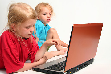 Image showing Playing on laptop