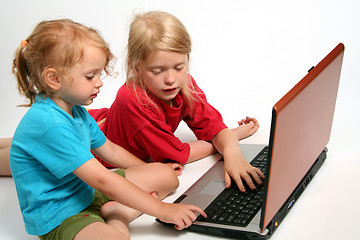 Image showing Playing on laptop