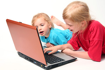 Image showing Playing on laptop