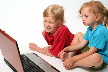 Image showing Playing on laptop