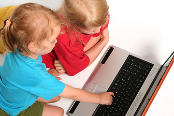 Image showing Playing on laptop