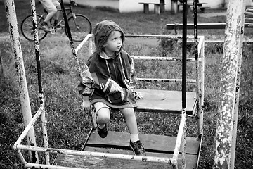 Image showing Little girl on swing