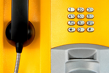 Image showing Yellow telephone