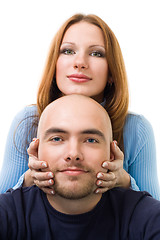 Image showing positive woman touching men's head