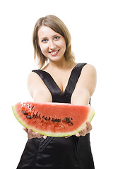 Image showing Young beautiful woman offer piece of watermelon