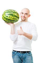 Image showing Bold man with watermelon