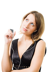 Image showing Woman listen music and dreaming