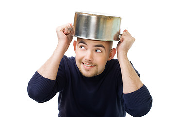 Image showing Man afraid and protecting with casserole