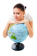 Image showing Positive caml woman with a globe