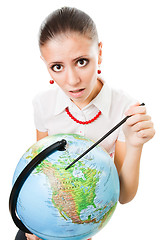 Image showing Sad woman with the globe