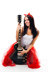 Image showing Sexy girl with black guitar and horns