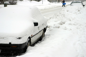 Image showing Snow coverd car