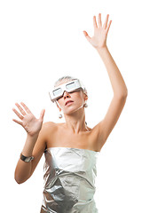 Image showing Futuristic woman in virtural reality glasses