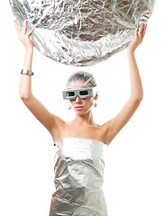 Image showing Future robot woman with silver disk