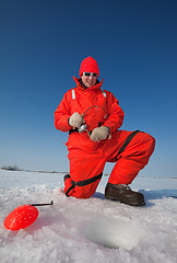 Image showing Smiling ice fisherman