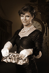 Image showing Old style woman picture with purse