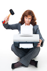 Image showing Business woman angry on her printer