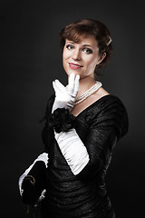 Image showing Respectable woman in white gloves