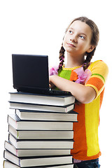 Image showing Teenager girl with books and laptop smile