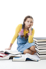 Image showing Young sad teenager girl tired from learning