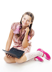 Image showing Teenager girl sit holding small laptop