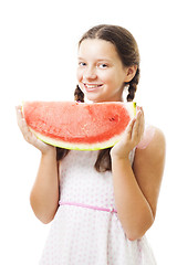 Image showing Girl with watermelon stand and smile