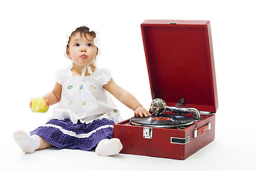 Image showing Adorable Toddler girl with gramophone
