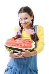 Image showing Happy teenager girl holding half of watermelon