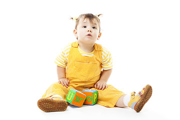 Image showing Young kid play with block with letters