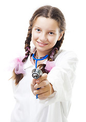 Image showing Happy young girl play doctor holding stethoscope