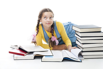 Image showing Clever teenager girl with books