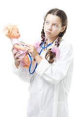 Image showing girl play doctor healing the doll