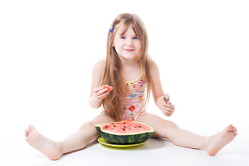 Image showing Happy little eat watermelon