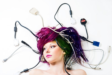 Image showing Woman lay on the floor with wires and plugs