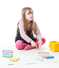 Image showing Little girl draw picture with chalk