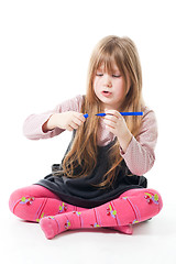 Image showing Little girl with felt pen