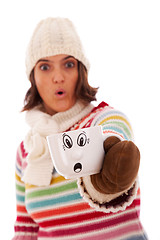 Image showing Surprised woman like her hot drink cup